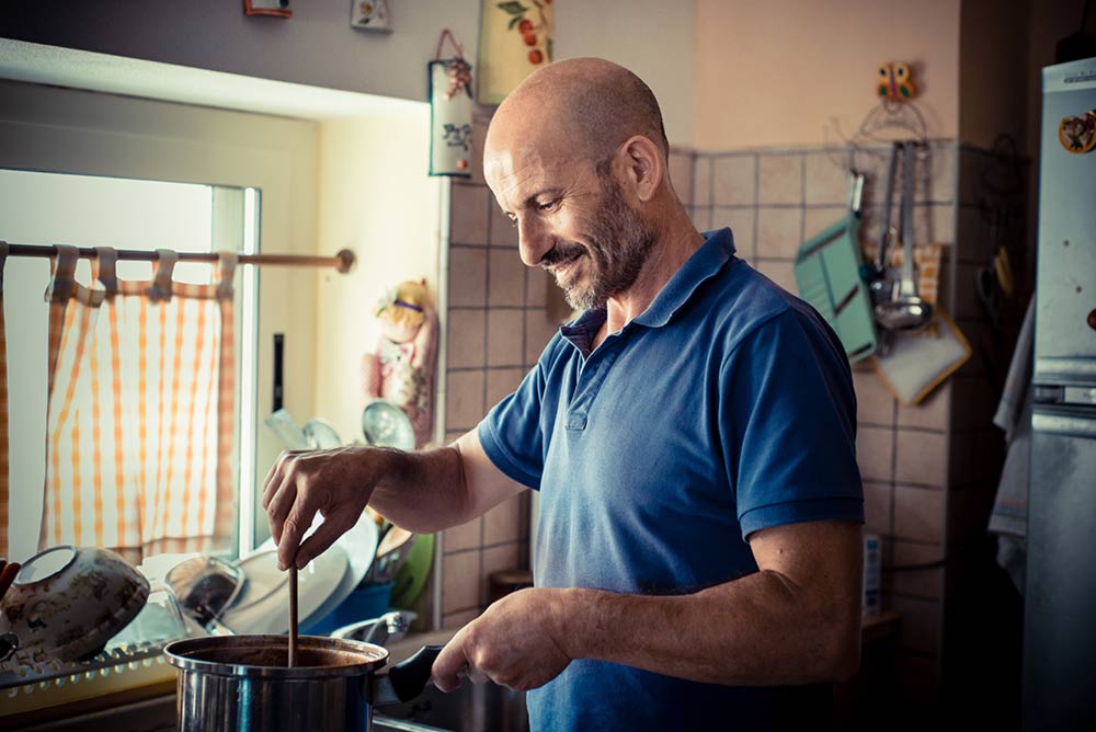 middle-aged man cooking