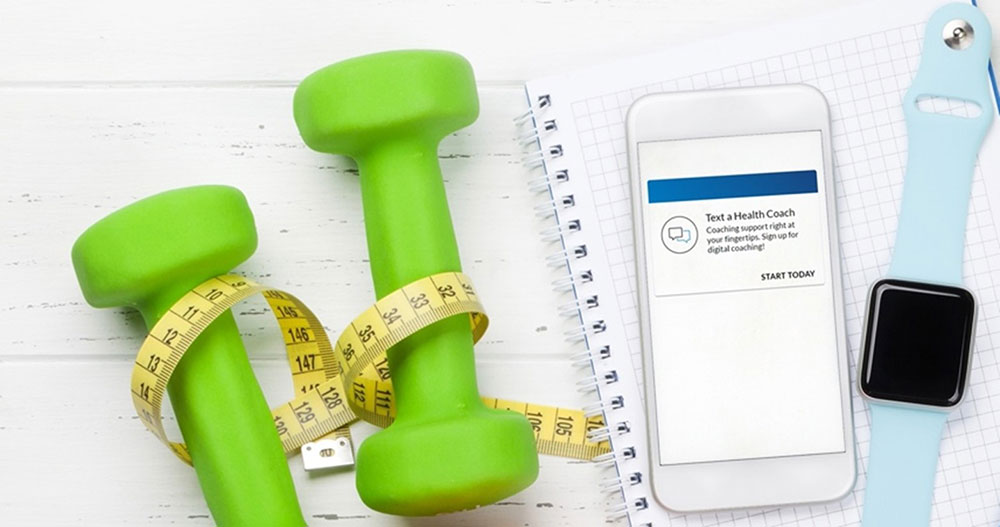 Dumbbells, tape measure, smart phone and smart watch